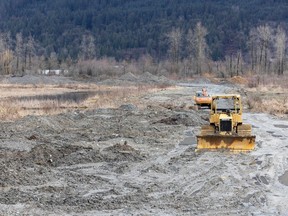 Illegal dumping isn't a new problem in B.C., but there's evidence it's a growing one as governments push rapid housing development and work to divert organic material from landfills. A file photograph shows a former blueberry field near Mission partially covered in gravel.