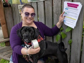 Holly Atkins and her dog Murphy. Atkins is posting flyers at Trafalgar Street and W. 2nd Avenue in Vancouver, BC Thursday, May 16, 2024 hoping to gather support for an off-leash space for dogs in Kitsilano.