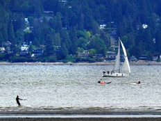 File photo: A wind surfer in action during low tide at Spanish Banks Beach in Vancouver on May 22, 2023.