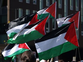 Palestinian flags wave at an encampment at University of B.C., one of many student protests in support of Palestinians during the Israel-Hamas conflict.