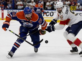 The Edmonton Oilers' Leon Draisaitl (29) battles the Florida Panthers' Oliver Ekman-Larsson (91) during the first period of Game 4 of the Stanley Cup Finals at Rogers Place, in Edmonton Saturday June 15, 2024. Photo by David Bloom