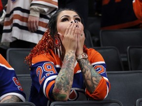 EDMONTON, CANADA - JUNE 13: An Edmonton Oilers fan reacts during the third period of Game Three of the 2024 Stanley Cup Final against the Florida Panthers at Rogers Place on June 13, 2024 in Edmonton, Alberta, Canada.