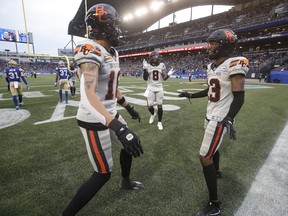 The BC Lions receivers dance in the end zone.