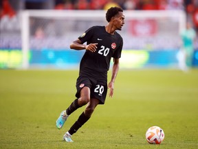 Ali Ahmed moves the ball for Team Canada.