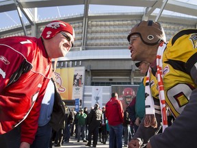 Fans face off outside BC Place.
