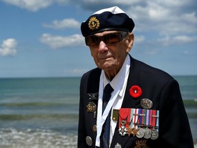 Canadian veteran Bill Cameron poses during the international ceremony on Juno Beach in Courseulles-sur-Mer, Normandy, northwestern France, on June 6, 2019, as part of D-Day commemorations marking the 75th anniversary of the World War II Allied landings in Normandy.