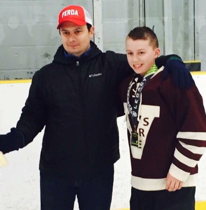 Hockey coach Jon Calvano with future Regina Pats star Connor Bedard.