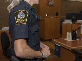 B.C. Provincial Court sheriff in a B.C. courthouse.