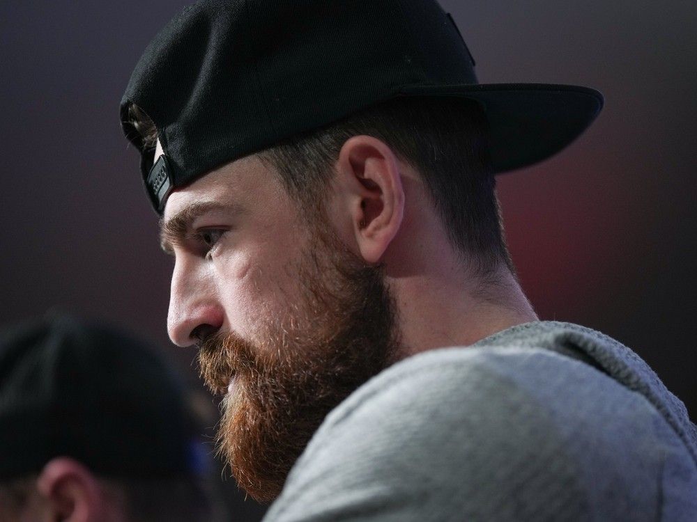 Vancouver Canucks' Filip Hronek listens during the NHL hockey team's end of season news conference, in Vancouver, B.C., Thursday, May 23, 2024.