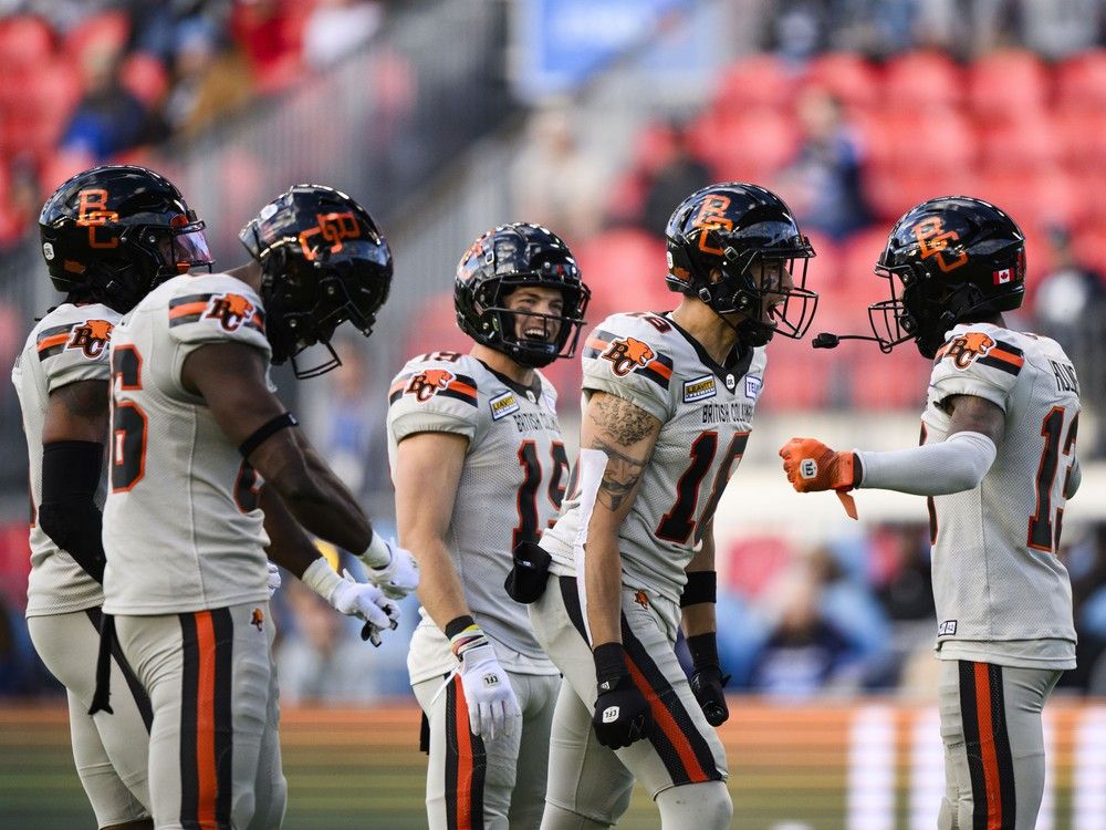 B.C. Lions wide receiver Justin McInnis (18) celebrates with teammates after scoring a touchdown during first half CFL action against the Toronto Argonauts, in Toronto, on Sunday, June 9, 2024.