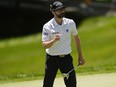 The Memorial was arguably the toughest challenge of the PGA Tour season, but Adam Hadwin rode its ups and downs to his best showing this year. Hadwin waves after putting on the fourth green during the final round of the Memorial golf tournament, in Dublin, Ohio, Sunday, June 9, 2024.