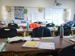 The school district in Burnaby, B.C., has launched an investigation into what it says was a harmful exam where students were asked to make arguments over whether Jewish people deserve or need a homeland. A workbook is seen on a student's desk in an elementary school classroom in Vancouver, B.C., Thursday, April 13, 2023.