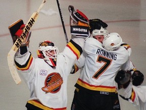 Kirk McLean celebrates after the Canucks win against the Toronto Maple Leafs during the Stanley Cup playoffs.