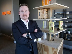 Jason Carruthers, owner of Mad Wax hair removal spa, is shown at the location in Windsor, Ont., in 2018.