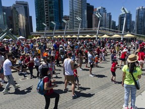 Thousands of people took part in Canada Day festivities at Jack Poole Plaza near Canada Place on July 1, 2022.