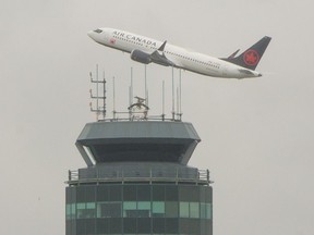 An Air Canada flight takes off from YVR in Richmond on Oct. 17, 2021