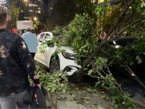 A white Mercedes crashed into several other vehicles and nearly hit pedestrians in downtown Vancouver on Friday night.