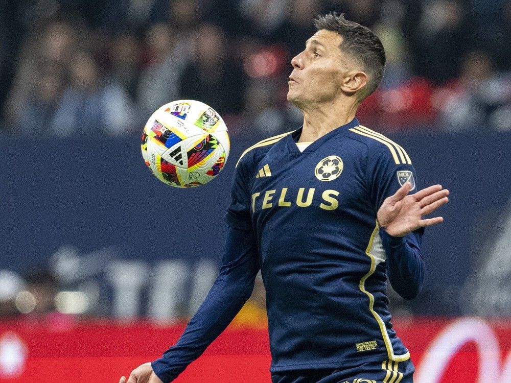 Vancouver Whitecaps' Damir Kreilach (19) stops the ball during the second half of an MLS soccer match against Charlotte FC in Vancouver, on Saturday, March 2, 2024.