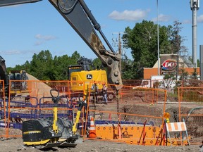 The water main break repair project in Calgary was on hold June 13. Occupational Health and Safety investigators were at the scene after two workers were hurt at the site on Wednesday evening.