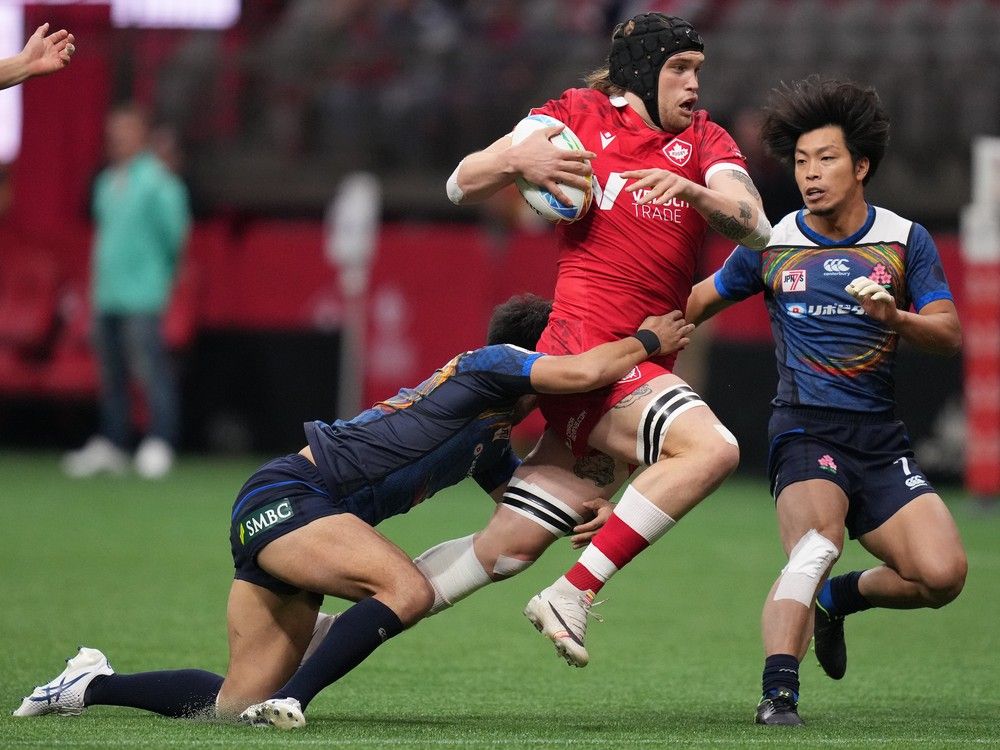 Canada's Jake Thiel is tackled by Japan's Kazuma Nakagawa during HSBC Canada Sevens rugby action in Vancouver in 2022. Thiel has joined the newly formed Vancouver Highlanders.
