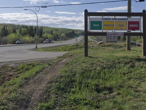 An extreme fire warning sign is shown along Highway 97 toward Fort Nelson. North of Fort Nelson, the Patry Creek fire is now considered out of control.
