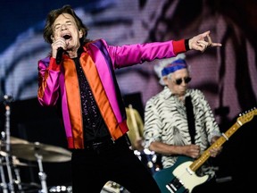 The Rolling Stones' Mick Jagger, left, and guitarist Keith Richards perform during a concert as part of their European Tour in Decines-Charpieu's Stadium, near Lyon, France, on July 19, 2022.