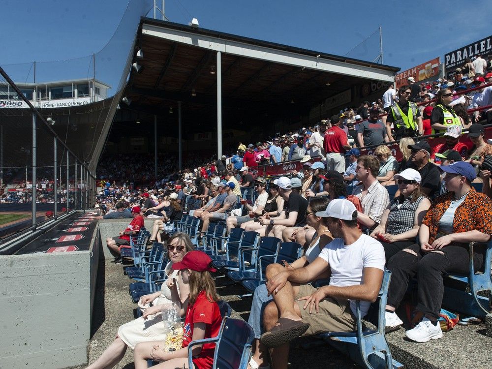 Fans enjoy the warm weather and sunshine as the Vancouver Canadians play the Eugene Emeralds at Nat Bailey Stadium in Vancouver, BC Saturday, April 29, 2023.