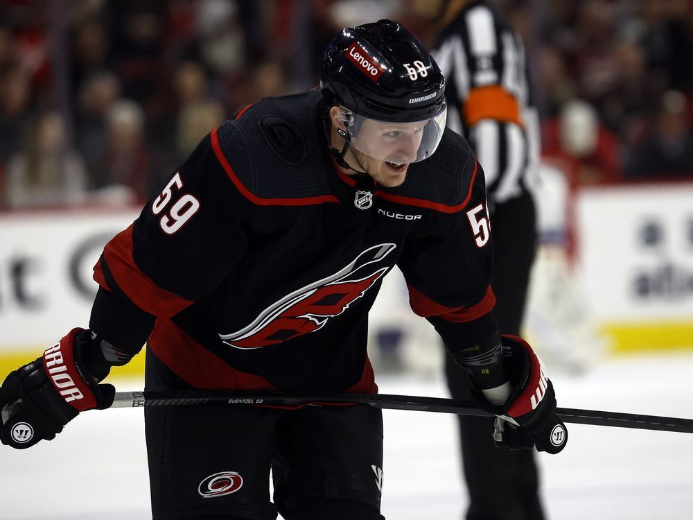 Carolina Hurricanes' Jake Guentzel (59) skates against the New York Islanders during the third period in Game 2 of an NHL hockey Stanley Cup first-round playoff series in Raleigh, N.C., Monday, April 22, 2024. The Atlantic Division got down to business ahead of NHL free agency's opening bell.The Tampa Bay Lightning signed prized winger Jake Guentzel to a seven-year, US$63-million deal Monday -- roughly three hours before players on expiring contracts went to market at 12 p.m. ET.