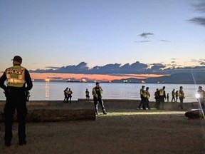Vancouver police patrolling at English Bay Beach on the day of the solstice, June 20.