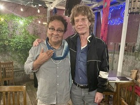 Vikram Vij and Mick Jagger at Vij's Restaurant in Vancouver after the Rolling Stones played B.C. Place this weekend.