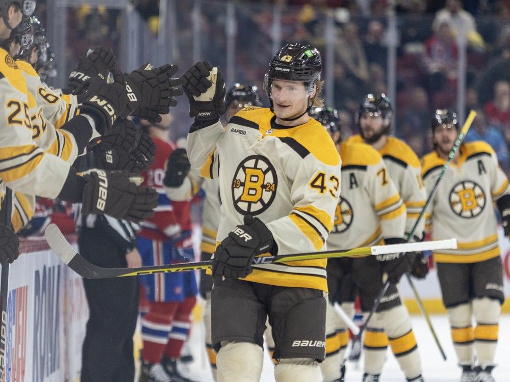 Boston Bruins Danton Heinen is greeted by team-mates after scoring first period goal against the Montreal Canadiens in Montreal Thursday March 14, 2024. Heinen will be playing for his hometown team the Vancouver Canucks this season.