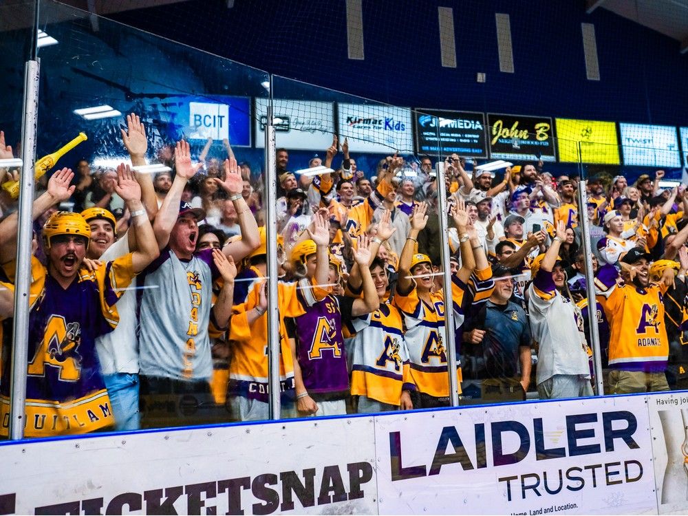 Coquitlam Adanacs fans celebrate their Minto Cup Junior A lacrosse national championship on Friday, Aug. 23