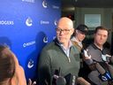 Canucks general manager Patrik Allvin speaks to reporters earlier this year.