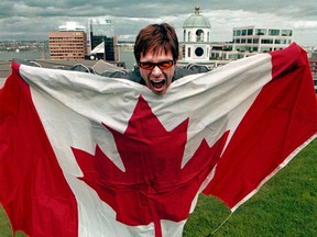 Jeff Douglas holds up a flag.