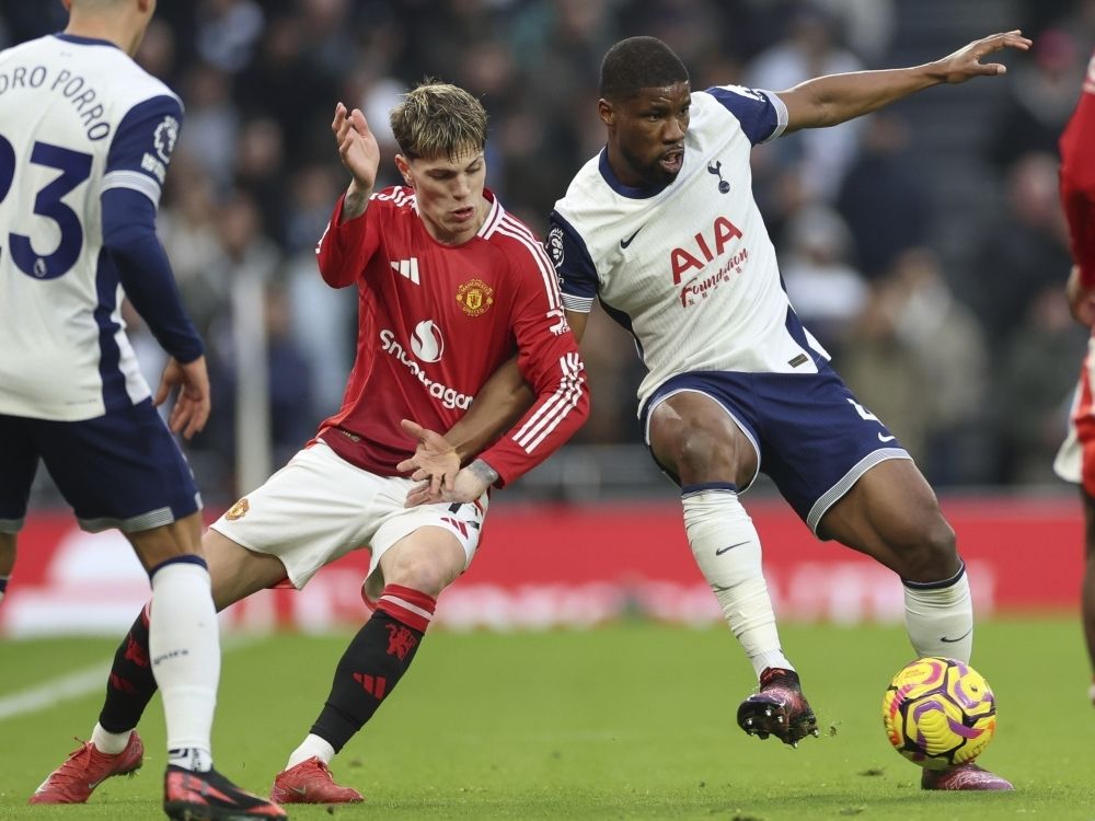Manchester United's Alejandro Garnacho, left, challenges Tottenham's Kevin Danso during an English Premier League match earlier this year.