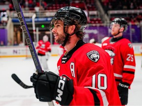 Charlotte Checkers forward Will Lockwood celebrates with teammates following a Game 3 win over the Laval Rocket in the AHL Eastern Conference finals on June 1, 2025