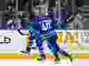 Vancouver Canucks winger Brock Boeser celebrates with Elias Pettersson after scoring. He has shootout and overtime winners this season.