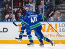 Vancouver Canucks winger Brock Boeser celebrates with Elias Pettersson after scoring. He has shootout and overtime winners this season.
