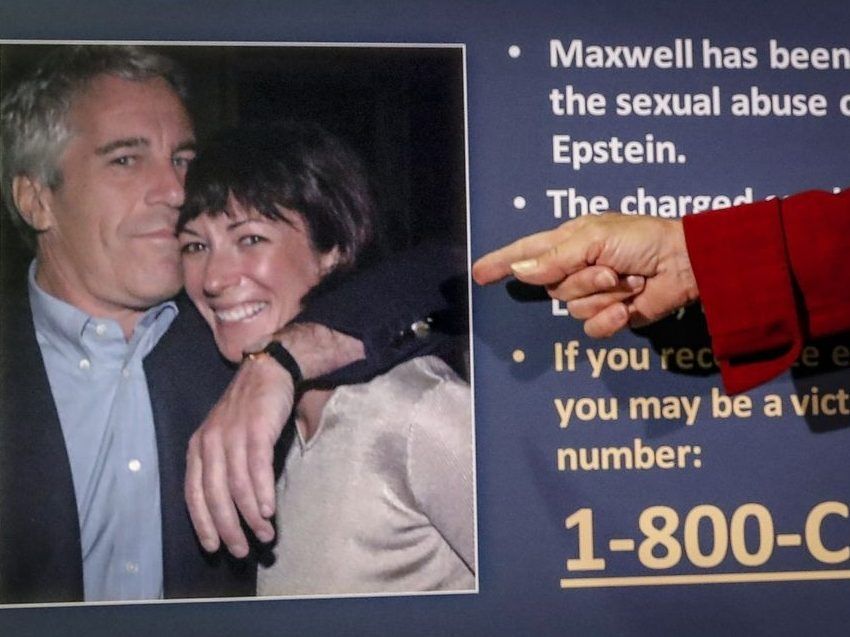 Audrey Strauss, acting U.S. attorney for the Southern District of New York, points to a photo of Jeffrey Epstein and Ghislaine Maxwell, during a news conference in New York on July 2, 2020.