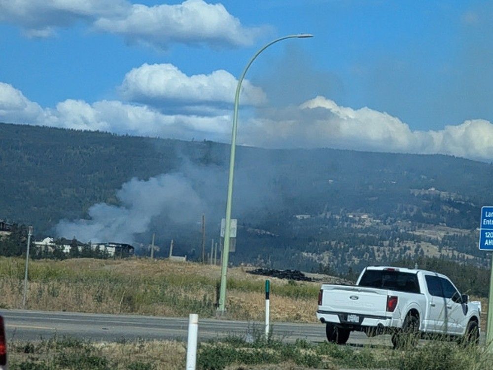 The wildfire is in the Ellison area to the east of the airport, where police conducted tactical evacuations of nearby homes