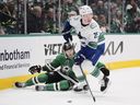 Vancouver Canucks defenceman Elias 'Junior' Pettersson takes control of the puck during a game in Dallas in April.