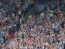 Whitecaps fans cheer on their team during a match against Houston Dynamo at B.C. Place on Aug. 17.