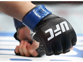 UFC branding on a glove at UFC 315 in Montreal, Saturday, May 10, 2025.