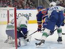 Edmonton Oilers captain Connor McDavid can't beat Vancouver Canucks goalie Thatcher Demko on Saturday Rogers Place. Oilers prevailed 3-1.