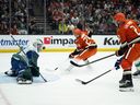 Canucks' centre conundrum remains as Raty goes for a reset 6 Vancouver Canucks goaltender Nikita Tolopilo (60) blocks a shot by Anaheim Ducks defenseman Jackson Lacombe (2) during the first period.