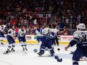 The Abbotsford Canucks celebrate winning the Calder Cup championship on June 23.