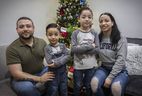 Brian Mascareno Llamas with his wife Fernanda and their two boys Darwin, 4 and Eiden, 5, at their Surrey home.