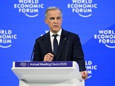 Prime Minister Mark Carney delivers a speech at the World Economic Forum in Davos, Switzerland on Jan. 20, 2026. He received a standing ovation for his remarks and global plaudits. Fabrice Coffrini/AFP