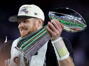 Sam Darnold #14 of the Seattle Seahawks celebrates with the Vince Lombardi Trophy after winning Super Bowl LX against the New England Patriots at Levi's Stadium on February 08, 2026 in Santa Clara, California.