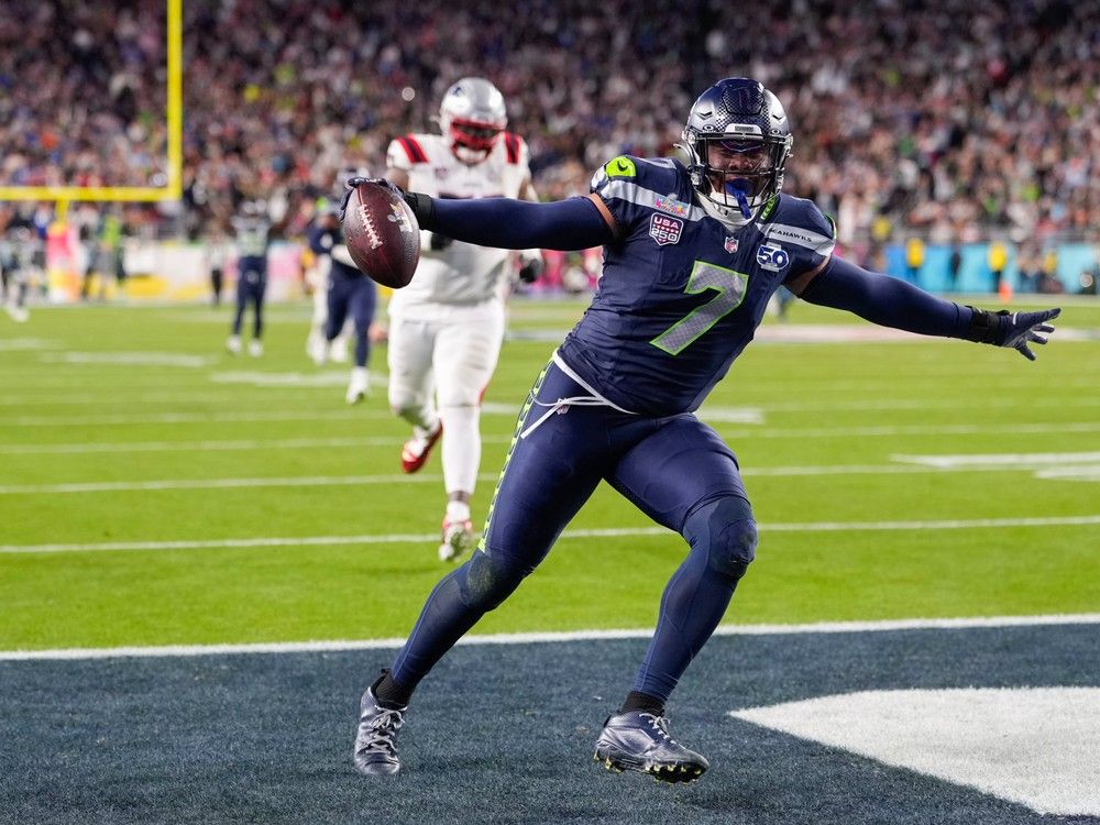 Seattle Seahawks linebacker Uchenna Nwosu (7) celebrates his touchdown on a fumble recovery during the second half of the NFL Super Bowl 60 football game against the New England Patriots, Sunday, Feb. 8, 2026, in Santa Clara, Calif.